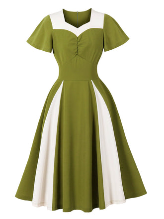 Grünes 50er Swingkleid mit Herzausschnitt und Kontrast