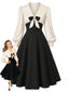 [Vorverkauf] Creme-schwarzes 50er Kleid mit Schleife und Ballonärmeln