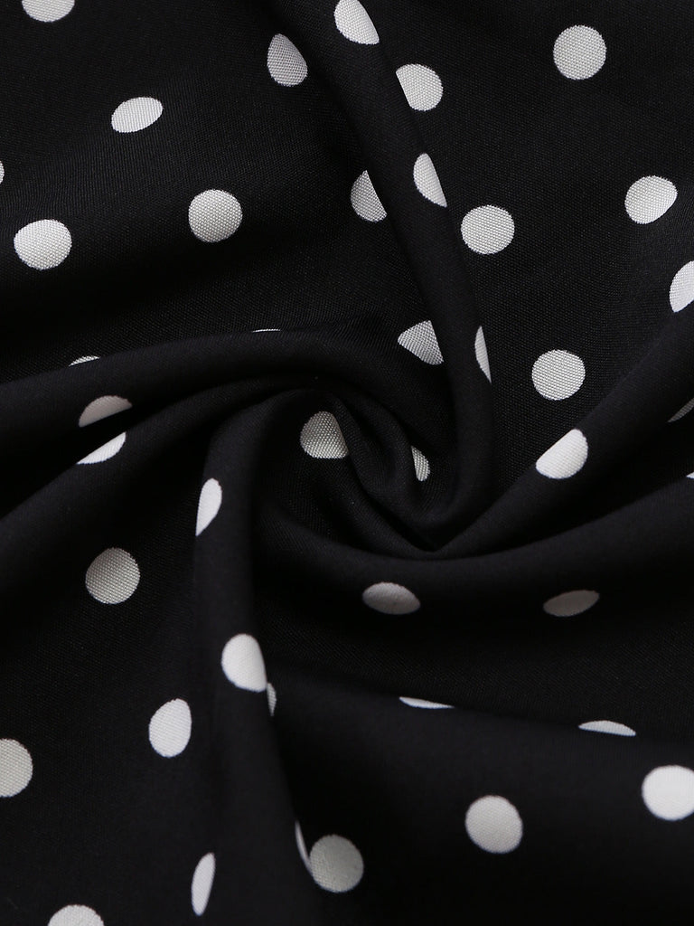Schwarzer 50er Carmen-Jumpsuit mit Polka-Dots und Schleife