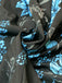 Schwarzer & Blauer 70er Jumpsuit mit Neckholder und Blumen