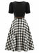 50er Puffärmelkleid mit kariertem Rockteil und Schleifen-Cut-out
