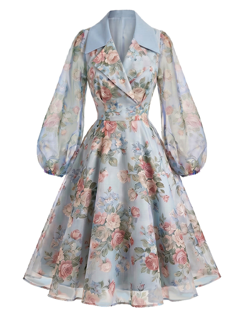 Blaues 50er Wickelkleid mit Blumen und Reverskragen