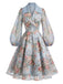 Blaues 50er Wickelkleid mit Blumen und Reverskragen