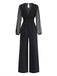 Schwarzer 30er Jumpsuit mit transparenten Ballonärmeln und Schlitz