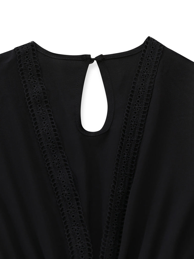 Schwarzer 30er Jumpsuit mit transparenten Ballonärmeln und Schlitz