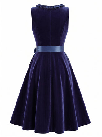 Marineblaues 50er Samtkleid & Schürze Set