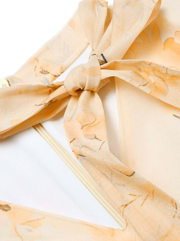 Oranges 50er Meshkleid mit Blumen und Ballonärmeln