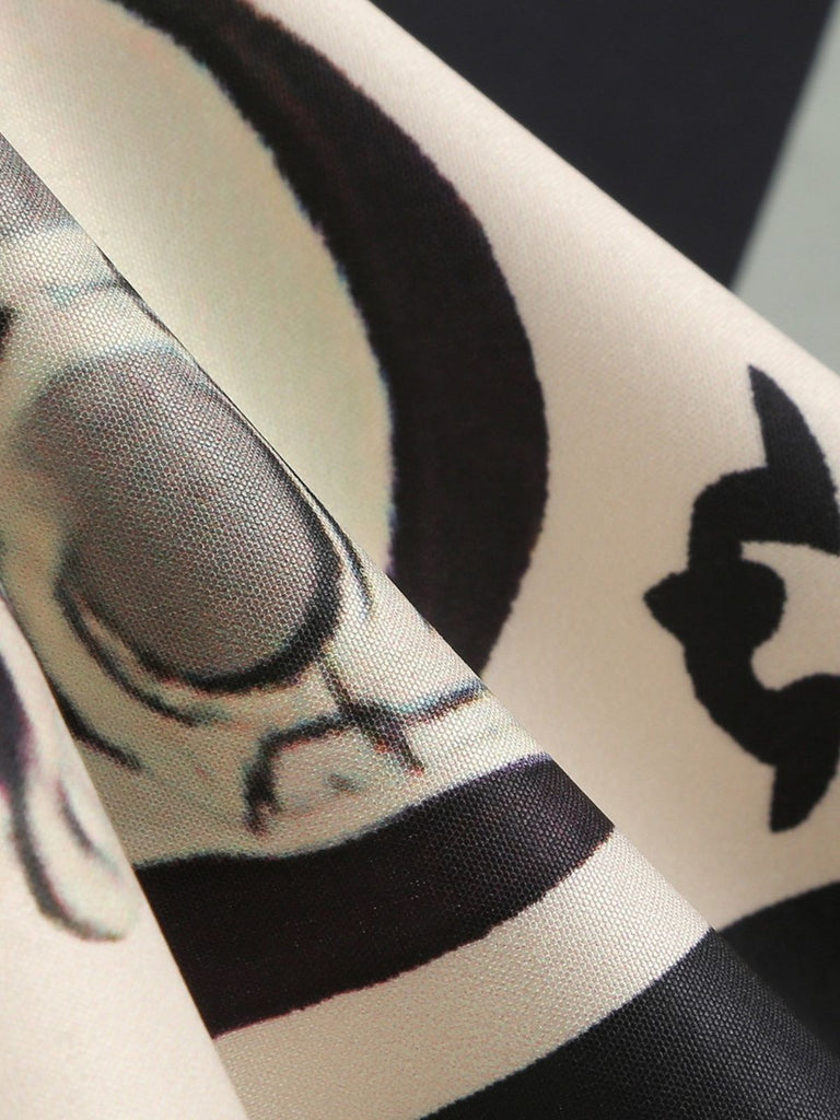 Schwarzes 50er Halloween Swingkleid mit Bat-Print und Totenkopf