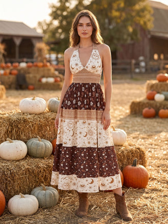 Braunes 70er Boho Smockkleid mit Blumen sowie Sternen und Mond