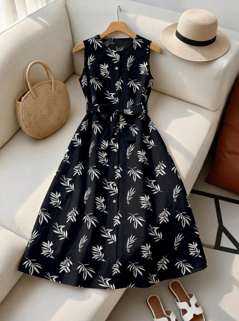 Tiefblaues 50er Kleid mit Blatt-Print und Gürtel