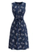 Tiefblaues 50er Kleid mit Blatt-Print und Gürtel