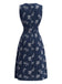 Tiefblaues 50er Kleid mit Blatt-Print und Gürtel