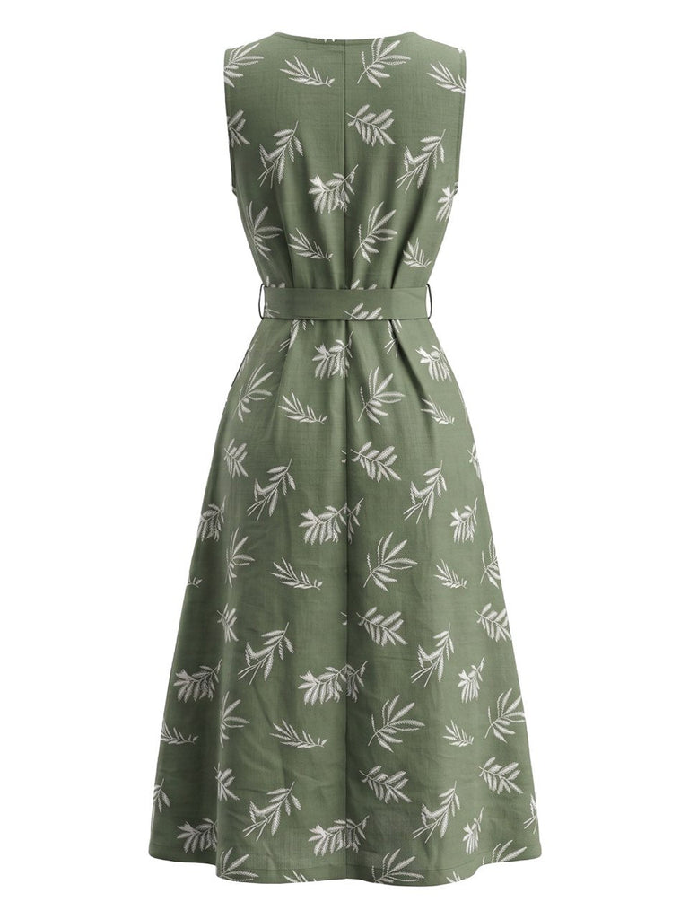 Tiefblaues 50er Kleid mit Blatt-Print und Gürtel