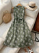 Tiefblaues 50er Kleid mit Blatt-Print und Gürtel