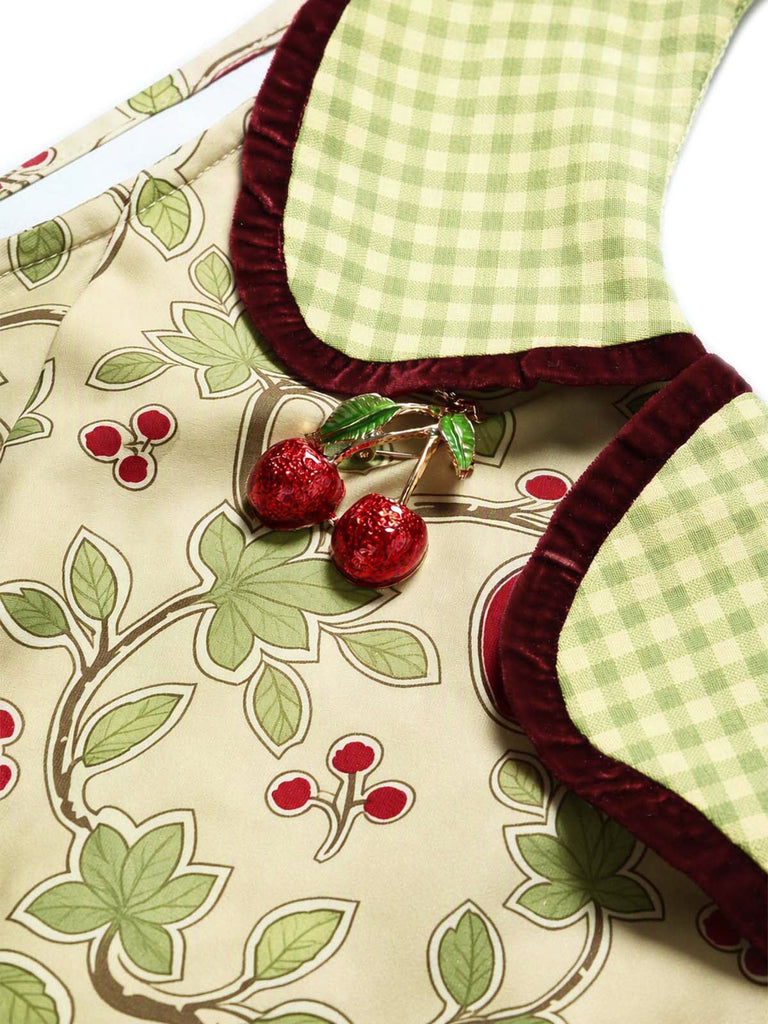 Gelbgrünes 60er Kleid mit Kirschen, Karokragen und plissiertem Karosaum
