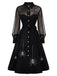 Schwarzes 50er Kleid mit Spinnennetz-Print und Mesh-Patchwork