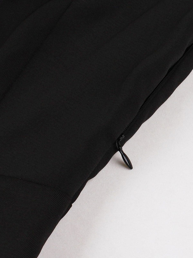 50er Reverskleid mit Kontrastpaspeln und Taschen