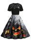 Schwarzes 50er Halloween Swingkleid mit Spinnennetz und Kürbis