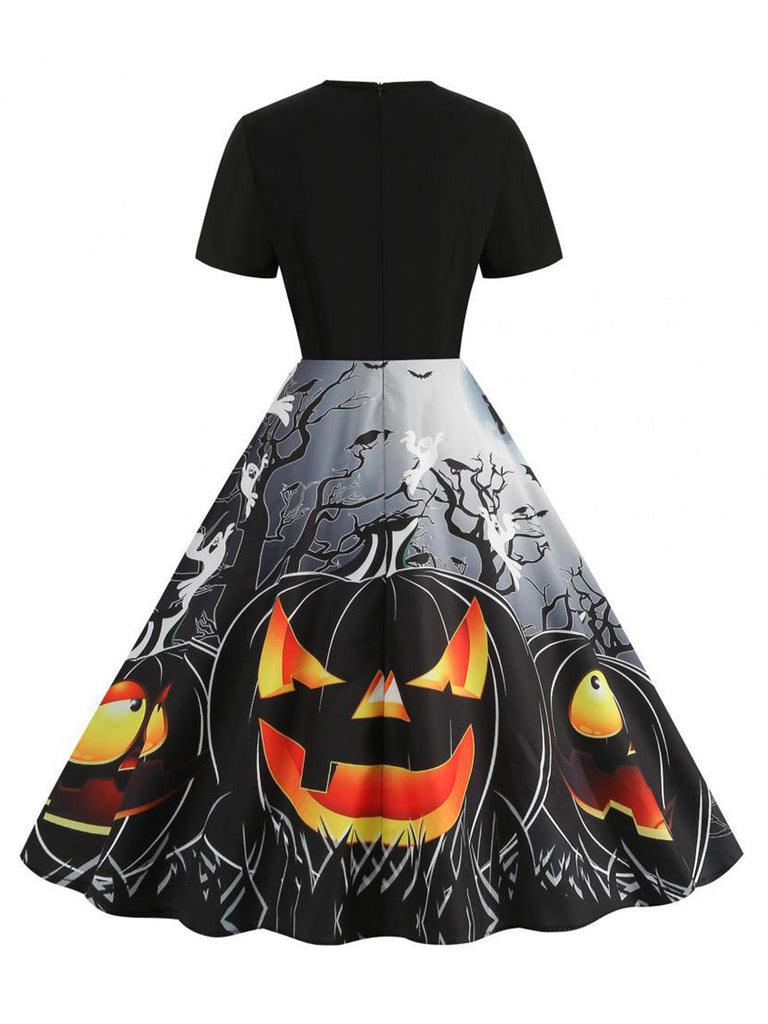 Schwarzes 50er Halloween Swingkleid mit Spinnennetz und Kürbis
