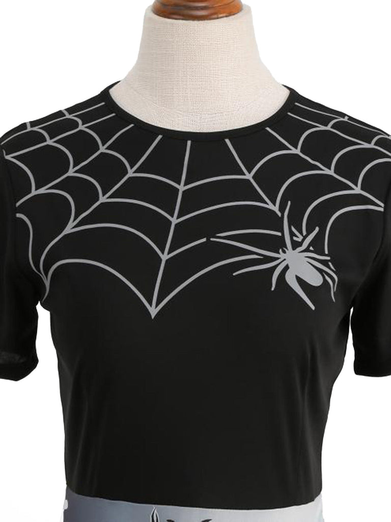 Schwarzes 50er Halloween Swingkleid mit Spinnennetz und Kürbis