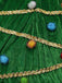 Grünes 50er Weihnachtsbaum-Kostümkleid mit Kapuze