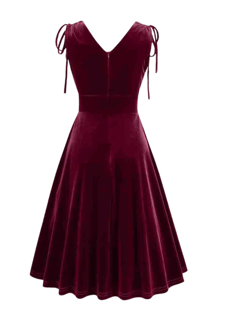 60er Samtkleid mit V-Ausschnitt und Schleifenträgern