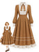 Hellkhakifarbenes 40er Kleid im Zweiteiler-Look mit Wellenbesatz