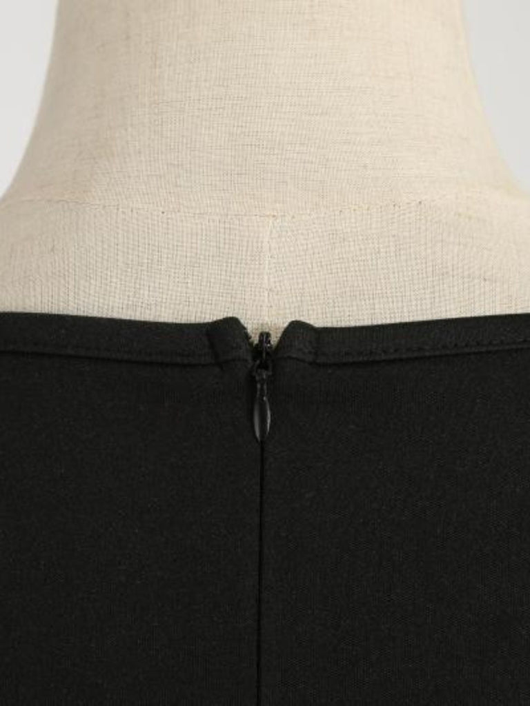 Grünes 50er Weihnachtsmannkleid mit gewelltem V-Ausschnitt