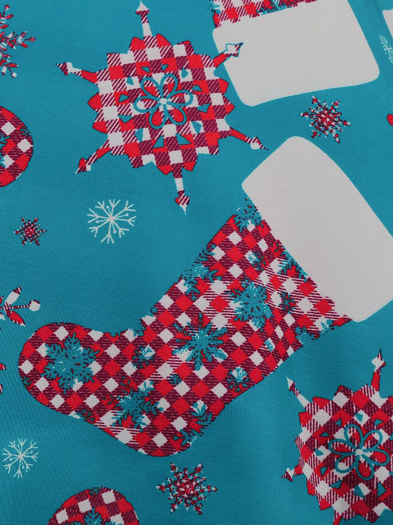 Blaues 50er Weihnachts-Swingkleid mit Strumpf-Print und Wellenausschnitt