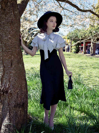 Schwarz 1930er Dots Krawattenhals Meerjungfrauenkleid