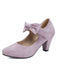 Pumps mit Schleife und Blockabsatz
