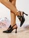 Schwarze Pumps mit Spitz und Slingback
