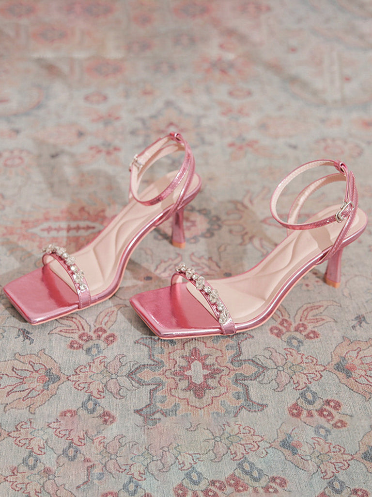 Rosa Sandalen mit Kristall und Riemen