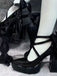Schwarze spitze Mary-Jane-Schuhe mit gekreuzten Knöchelriemen