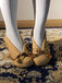 Vintage Pumps mit Polka-Dots und Quasten-Schleife