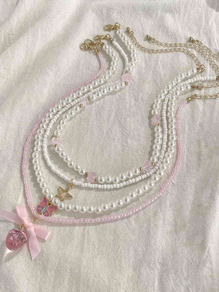 Rosa & Weiß Perle Bogen Schmetterling Halsketten Set