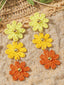 Ombre Raffia-Ohrringe mit Margeriten und Dreifach-Anhänger