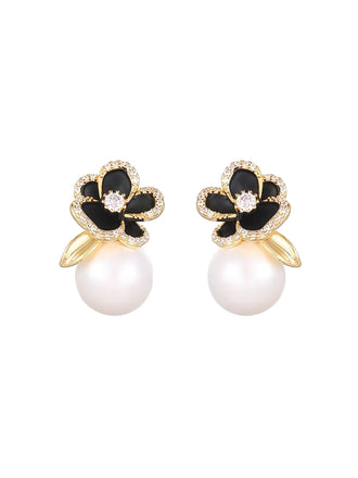Goldene Ohrringe mit Blumen und Strass