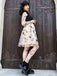 50er Kleid mit Schmetterlings und Patchwork in Schwarz