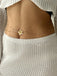 Goldener Body mit Blumen und Perlen