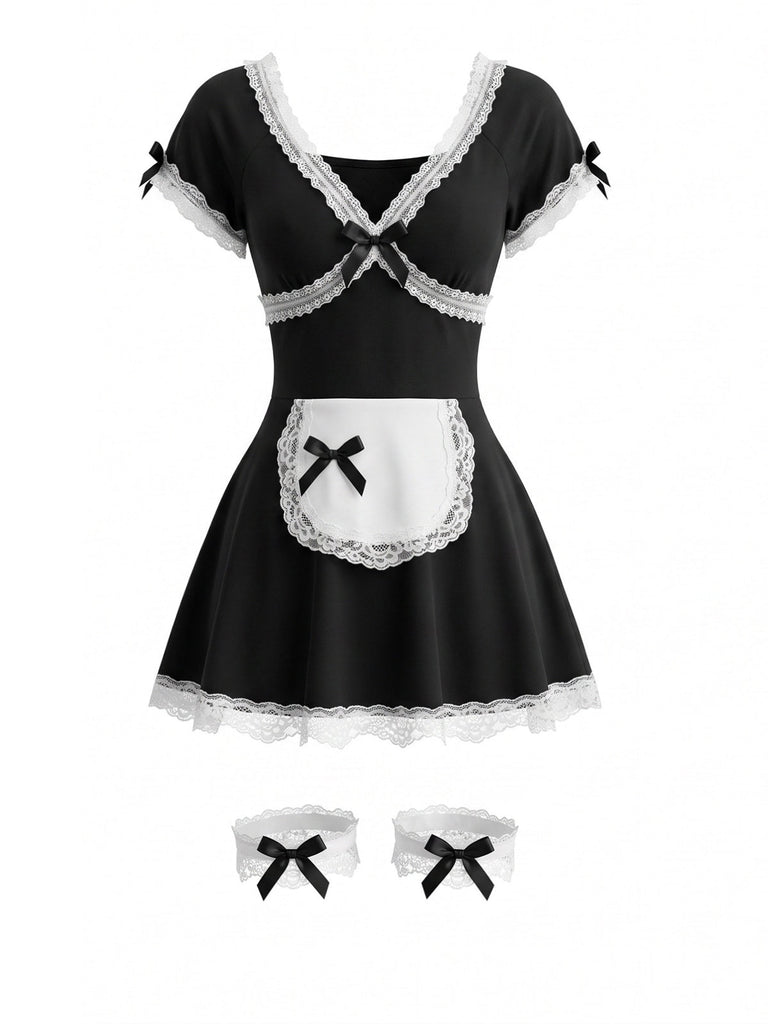 Schwarzes 80er Dienstmädchenkleid mit Schleife und Strumpfbändern