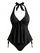Retro-Tankini im Stil der 50er Jahre mit strukturiertem Blumenmuster, tiefem V-Ausschnitt und Neckholder-Trägern für einen klassischen Strandlook.