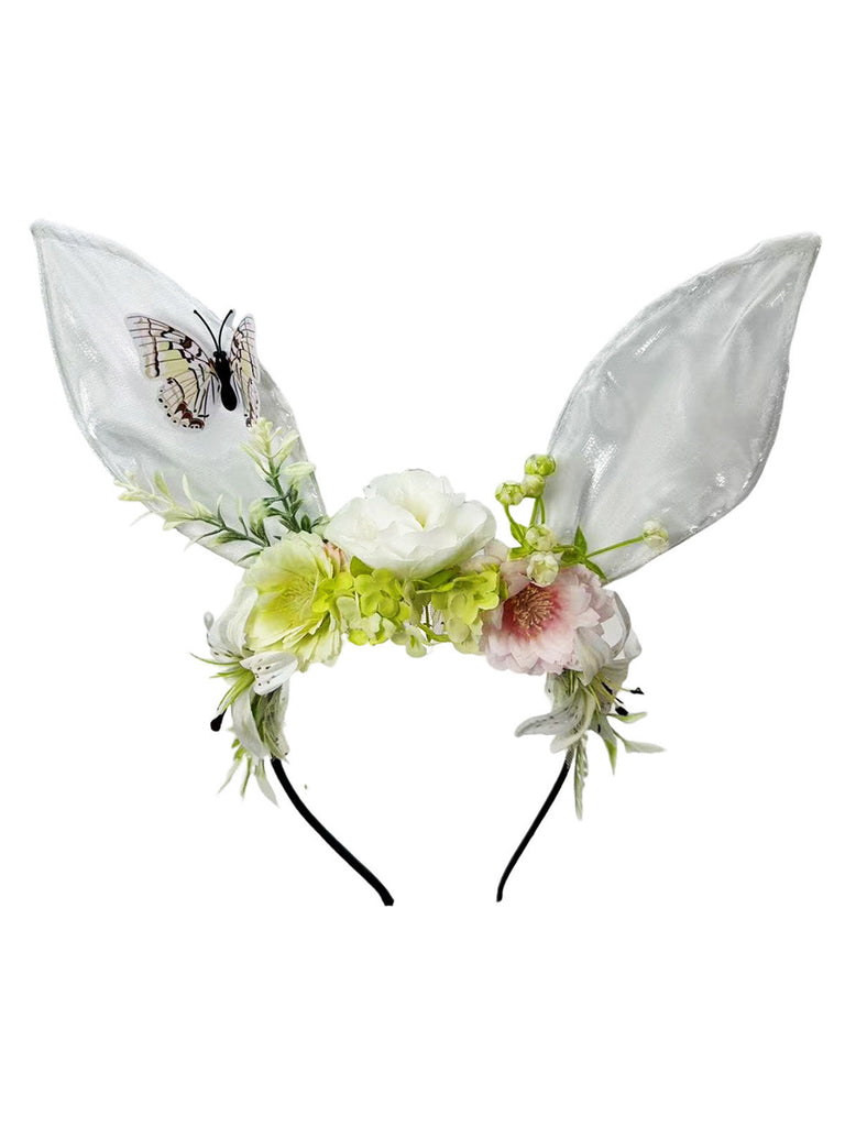 Verspieltes, rosafarbenes Fairycore-Haarband mit transparenten Hasenohren, Seidenblumen und einem lila Schmetterlingsakzent.