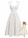 Weißes 40er Smockkleid mit Blumen und Bindeband