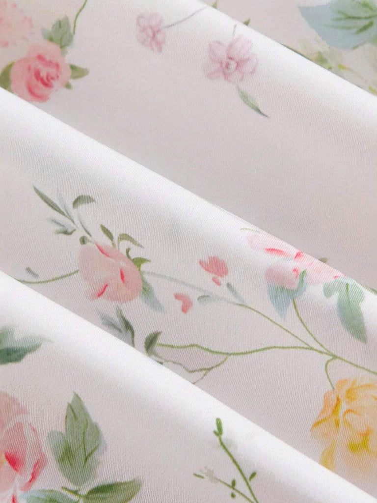 Weißes 40er Smockkleid mit Blumen und Bindeband