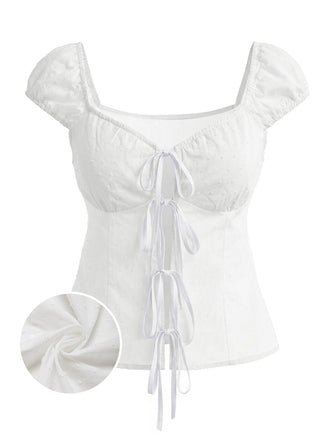 Weiße 70er Bluse mit Polka-Dots und Schleife