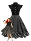 Schwarzes 1950er Polka Punkte Bogen Swing Kleid