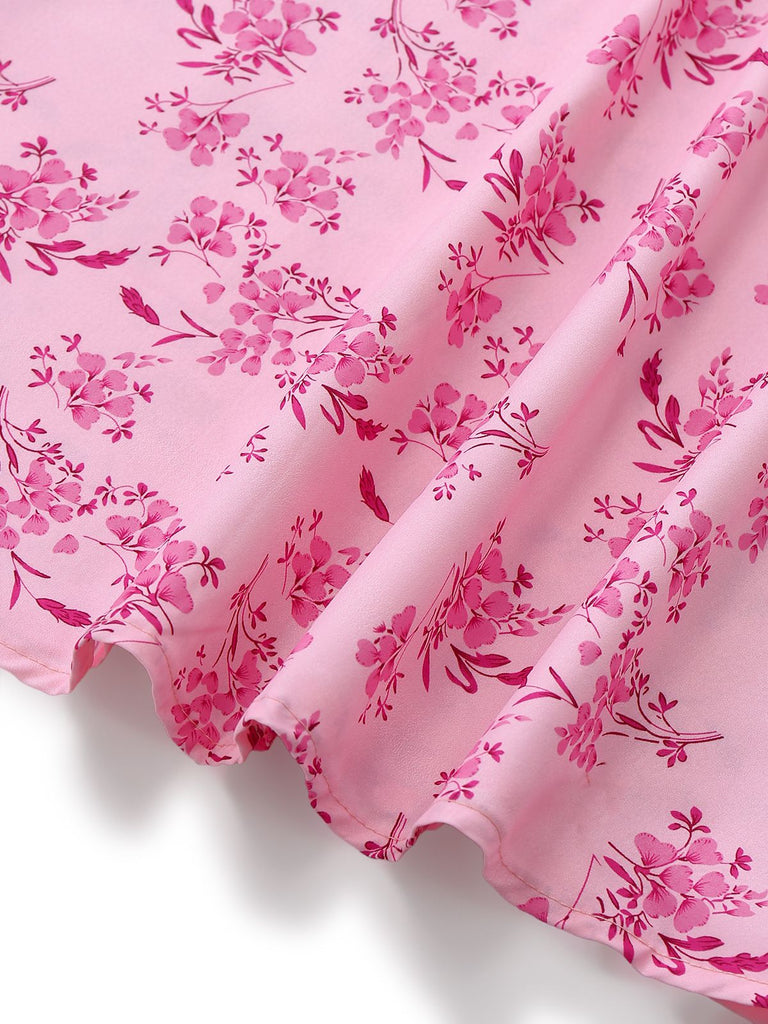Detailaufnahme des leichten, floralen Stoffs, der am Saum drapiert ist.