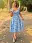 Blaues 50er Swingkleid mit Puffärmeln und Blumen