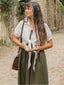 Grünes 50er Set aus gesmoktem Midikleid mit Spaghettiträgern und kurzem Shirt